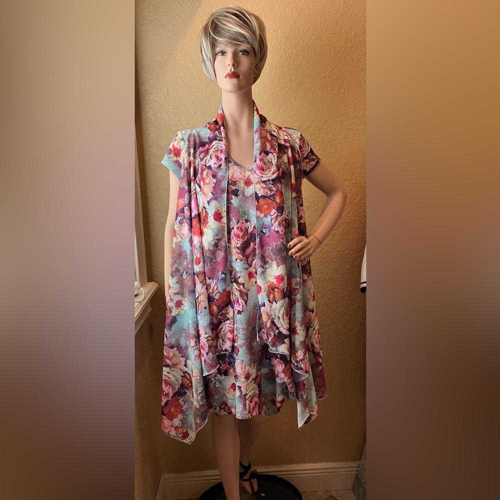 PURE ESSENCE Long Floral Open Vest matches a Dress sold separately.